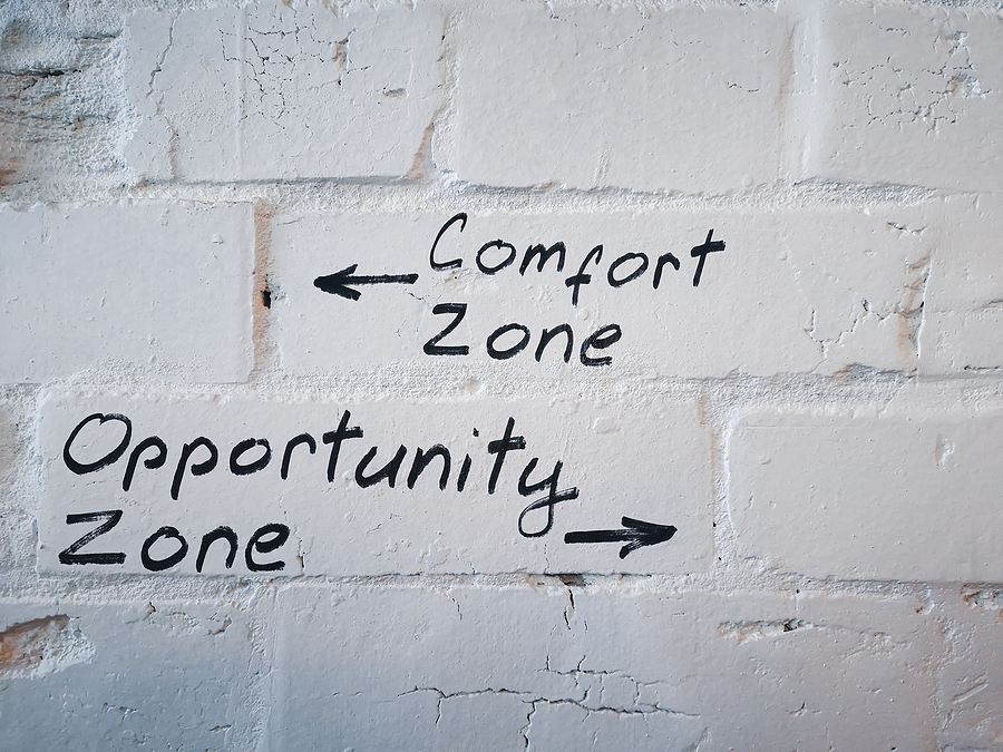 Wall with graffiti - comfort zone vs opportunity zone